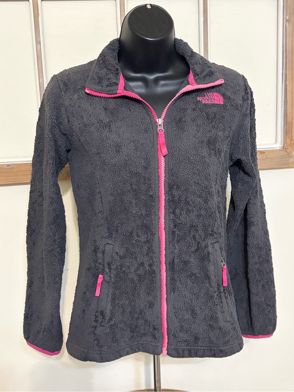 The North Face Girl’s Charcoal Fleece Jacket with Pink Trim